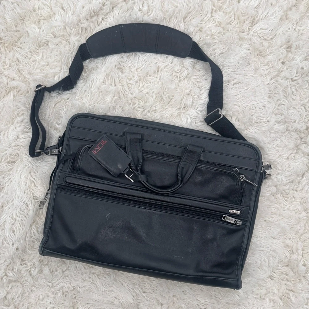 Tumi Black Leather Briefcase with Expandable Pouches Compartments
